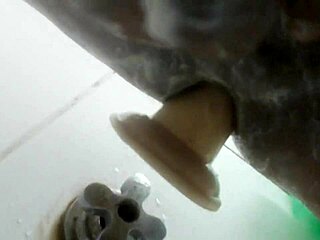 Enjoying some solo pleasure with my dildo in the shower