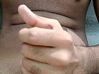 In the public outdoors, two young indian desi gays have fun with a horny big cock.