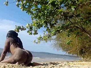 A young woman dances naked in the forest near a beach and gets some street attention