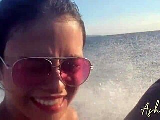 Escaping the city on a jet ski, this beautiful asian amateur with narrow ass and tits got her pussy filled with cum in doggystyle on the beach.