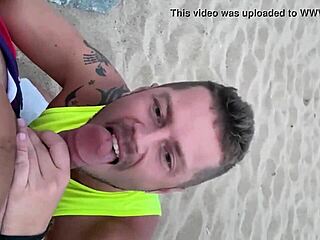 Two Gay Men Engage In Public Blowjob On Beach