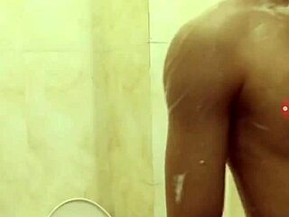 Two guys share a casual gay moment on stage