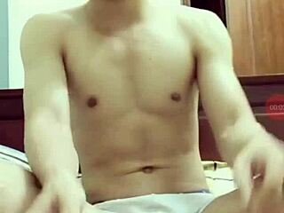 Two guys share a casual gay moment on stage