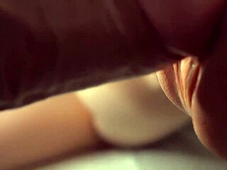 Detailed view of a macro lens during doggy style penetration
