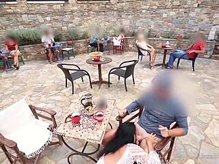 In the crowded restaurant, she pulled out his giant cock for an extreme public handjob scene.