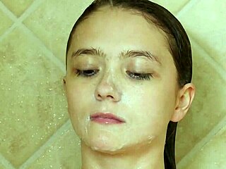 Beautiful brunette model washes up in the shower