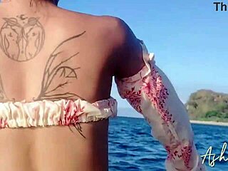 Escaping the city on a jet ski, this beautiful asian amateur with narrow ass and tits got her pussy filled with cum in doggystyle on the beach.