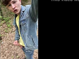 Young gay guy jerks off his big cock outdoors