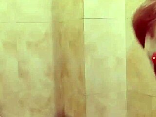 Two guys share a casual gay moment on stage