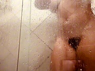 Milf captures herself cleaning her hairy slit in bathroom