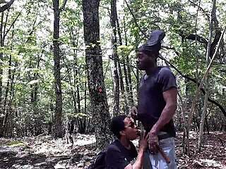 Southern babe licks ass and deepthroats in forest