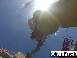 Olivia swims alone in the pool and enjoys herself