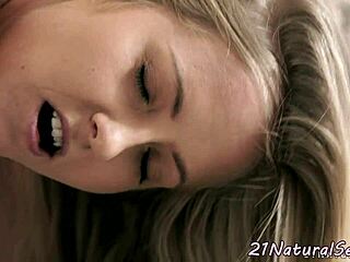 European babe indulges in solo masturbation, fingering her wet pussy passionately. She explores her body with erotic touches in a glamorous setting.