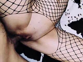 Cute wife in erotic fishnet bodysuit spreads legs wide!