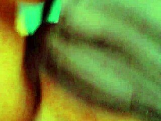 Amateur video of an overweight woman fingering herself