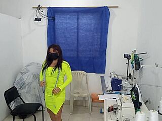 Slutty fashion designer flaunts big natural tits at work!