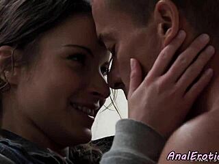 she's bent over getting anal banged outdoors