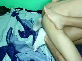 Beautiful woman with hairy arms and legs in lingerie in a bedroom