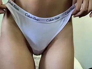 barely legal petite 18+ teen flaunts puffy pussy and teases with vibrator and panties