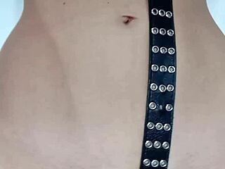 Punishing tits and pussy with belt