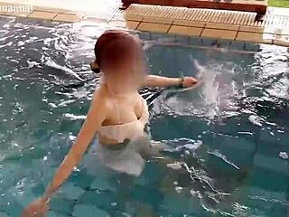 Beautiful Japanese girl swimming and exercising in the pool
