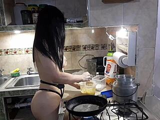 Estefani strips and dances while making pancakes in the video