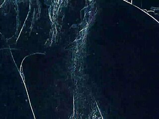 dancing in the night club with suggestive lighting