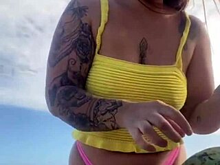 Wearing a bikini that exposes the big tits