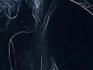 dancing in the night club with suggestive lighting