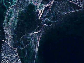 dancing in the night club with suggestive lighting