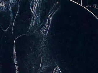 dancing in the night club with suggestive lighting