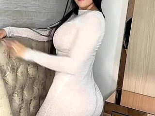 Colombian babe plays with her big tits and dildo