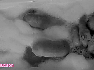 Kity Hudson takes a bath and plays with a toy