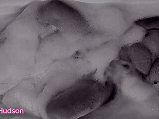 Kity Hudson takes a bath and plays with a toy