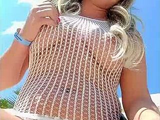 Check out this blonde in transparent dress without underwear flashing outdoors.