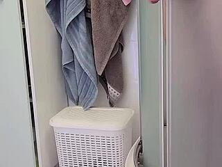 stepmom surprises son in bath, helping him jerk off with her big tits on display