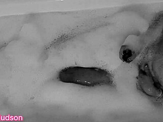Kity Hudson takes a bath and plays with a toy