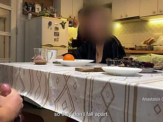 my husband jerks under table in front of step mom and me in kitchen