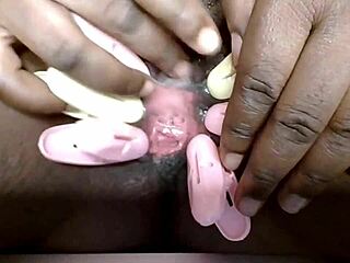 cyndy blackslave shows pussy closeup with clamps