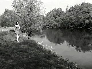 Beautiful brunette wife bathes outdoors in panties and skirt