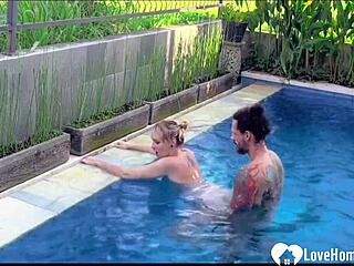 Enjoying the pool and playing with a strong dick