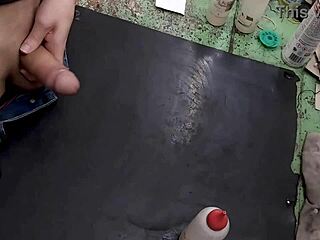 Young Guy Stroking On Workbench At Job.