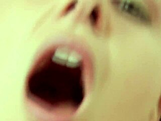 Brunette milf fingers her shaved pussy