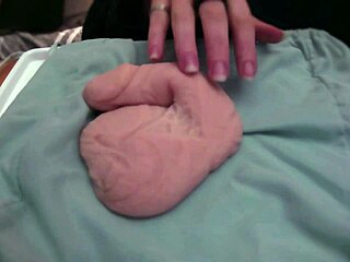 playing with a very soft and limp fake toy, no audio, homemade style