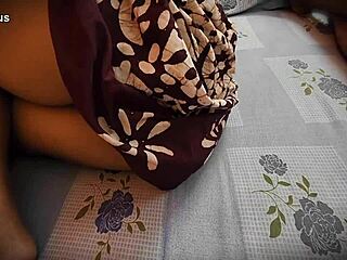 The step mom seduces her boy to play with her ass