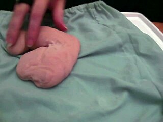 playing with a very soft and limp fake toy, no audio, homemade style