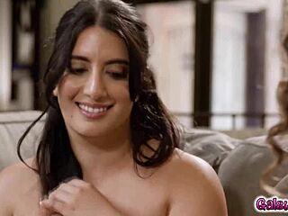 Arabelle Raphael and Sarah Arabic Engage in Lesbian Sex on Couch