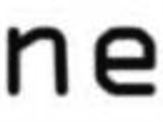 Alisa experiments with nipple stickers on the beach.