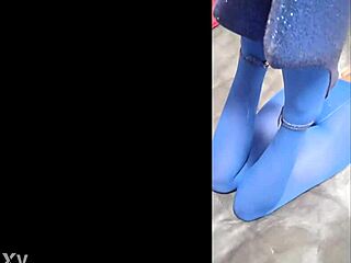 Sexy Pantyhose and Blue High Heels on Display in Fashion