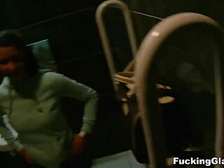 Teen in glasses reaches orgasm in public restroom